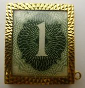 A 9 ct gold framed one pound note