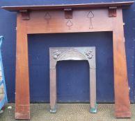 An Art Deco fire surround with a copper insert