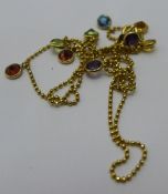 A gold multi coloured gem set necklace, marked 14K Italy. 40 cm long.