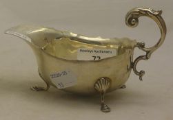 A silver sauce boat