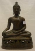 A bronze model of Buddha