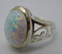 A silver and opal ring