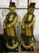 A pair of large Chinese pottery figural lamps,