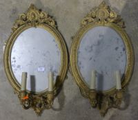 A pair of Victorian gilt girandoles