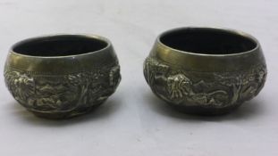 A pair of Indian silver salts