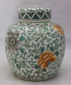 A 20th century Chinese porcelain ginger jar and cover worked with lotus strapwork