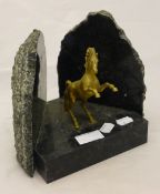 A gilt metal and mineral maquette of a rearing stallion