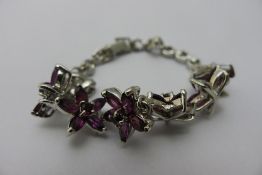 A florally set dress bracelet