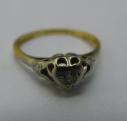 An 18 ct gold diamond solitaire ring (2.