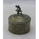 A Victorian embossed silver box and cover (108 grammes)