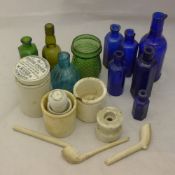 A quantity of poison bottles, a 19th century French petroleum lamp, etc.