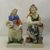 A pair of large Victorian Staffordshire figures,