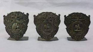 Three Indian silver menu holders