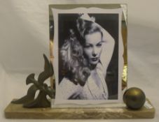 A French Art Deco art metal mounted marble photograph frame