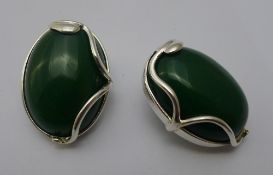 A pair of silver and jade clip earrings