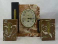 An Art Deco marble clock garniture