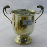 A twin handled silver trophy cup (294 grammes)