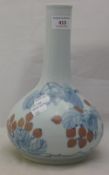 A small Chinese blue and red vase