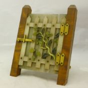 A Victorian hardstone inset gate form picture frame