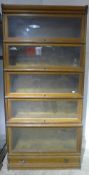 A five tier oak Globe Wernicke bookcase