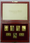 A presentation cased set of Royal Commemorative silver gilt stamps