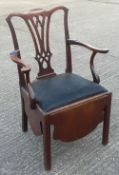 A George III mahogany commode chair