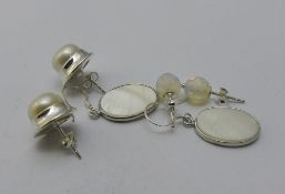 Three pairs of silver earrings