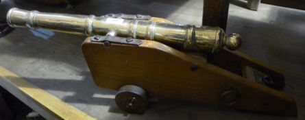 A bronze barrelled table canon