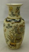 A 20th century Japanese porcelain vase worked with various jardinieres issuing flowers