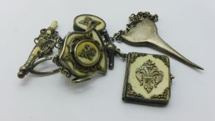 A Victorian ivory mounted silver plated chatelaine