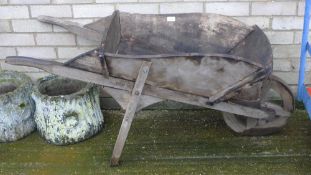 A vintage wooden wheelbarrow