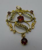 An Edwardian 9 ct gold pendant