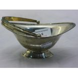 A pierced silver basket of navette form