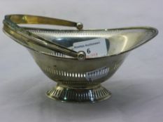 A pierced silver basket of navette form