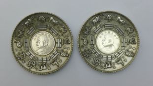 A pair of Chinese coin dishes