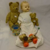 A vintage doll, two teddies, etc.