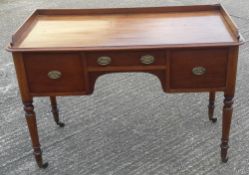 A Victorian mahogany wash stand with three quarter gallery