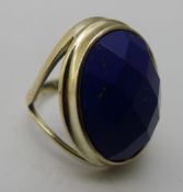 A silver and lapis ring