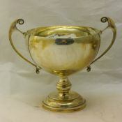 A twin handled silver trophy cup (270 grammes)