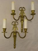 A pair of twin branch gilt metal wall lights