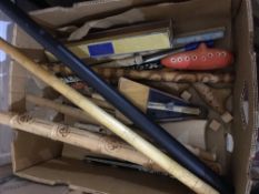 A quantity of carved wood and other flutes, etc.