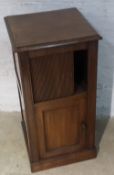 A Victorian mahogany tambour front pot cupboard