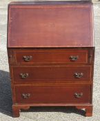 An early 20th century mahogany bureau