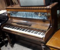 A Victorian rosewood piano