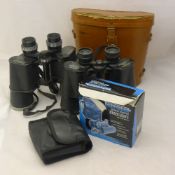 Three pairs of binoculars