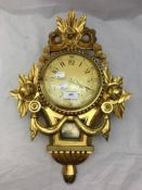 A giltwood Cartel clock
