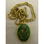 An unmarked yellow metal diamond set and enamelled photo locket on 9 K chain (11.6 grammes all in).