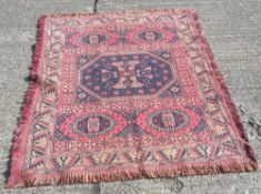 A red ground rug