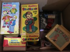 A quantity of tin plate toys,