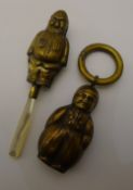 Two brass rattles